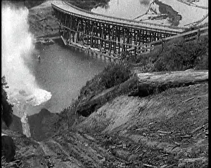Chute: Timber Going Down A Chute Into The River