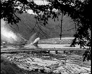 Chute: Timber Going Down A Chute Into The River