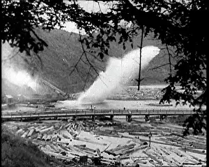 Chute: Timber Going Down A Chute Into The River