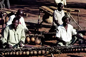 Xylophone: Four timbila xylophone players