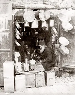 Tinsmith: Tinsmith at work in his shop, Cairo, Egypt, c.1880's