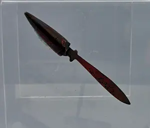 Opener: A tiny letter opener beaten from a copper bullet