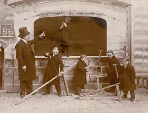 Sawing: Tiny Town carpenters constructing a shop