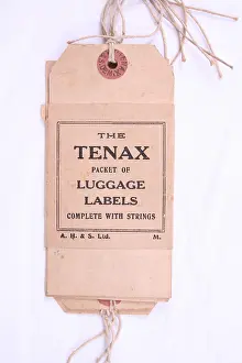2430: TME Tenax packet of stringed luggage labels
