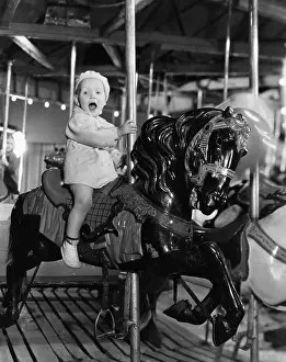 Carnivals: Toddler on carousel