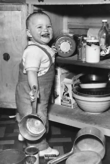 Cubes: Toddler helping out in the kitchen