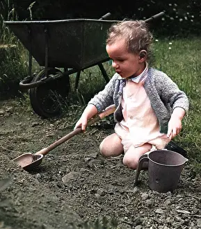 Andrew Besley: Toddler playing in garden