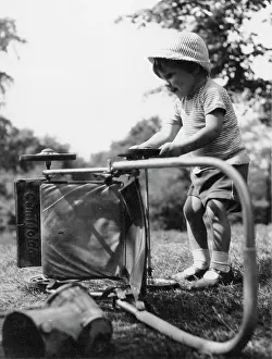 The John Krish Collection: Toddler playing with a pushchair