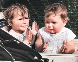 Prams: Two toddlers in a pram