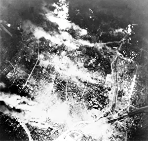 Firestorm: Tokyo burns under B-29 firebomb assault. In this