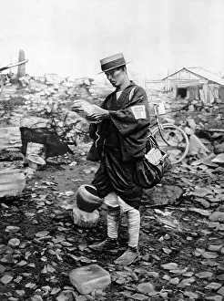 Neighbouring: Tokyo postman delivering letters to the rubble
