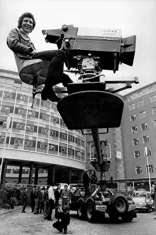 B.b.c: Tom Jones sitting on a camera crane at BBC