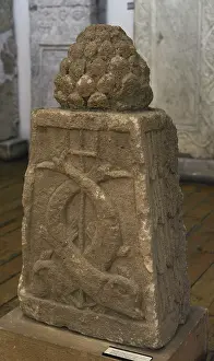 Conical: Tombstone. Pine cone, dolphins and trident. 2nd-3rd