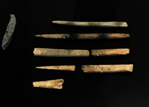 Lithic: Tools of flint and animal bones. Performed by Homo sapiens
