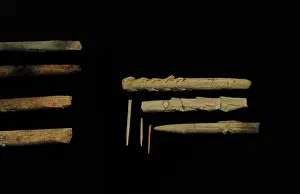 Lithic: Tools of flint and animal bones. Performed by Homo sapiens