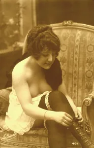Garter: Topless model posing in a sexy glamour pose