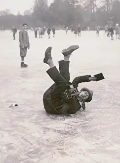 Toppled: Toppled photographer on the ice