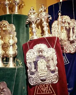 Breastplates: Several Torahs Residing in the Ark in a Synagogue