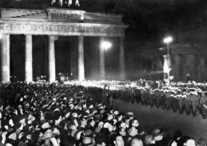Compare: Torchlight procession through the Brandenburg Gate, probably