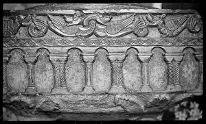 Reminiscent: Detail of a Tournai font with a square bowl