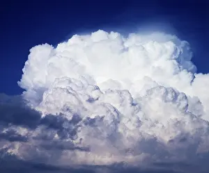 Rainstorm: Towering Puffy Cumulonimbus and Cumulus Clouds