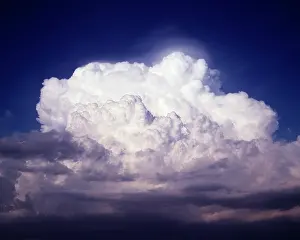 Vapor: Towering White Puffy Cumulonimbus Cloud a Billowing