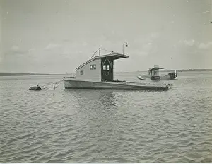 Lighter: Towing lighter adapted to be a floating dock for flying