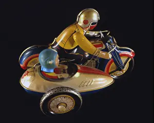 Clockwork: Toy motorcycle with sidecar