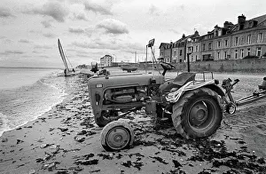 Tideline: Tractor on beach, Normandy, France