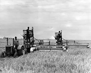 Spearman: A tractor used to pull two combines on a ?