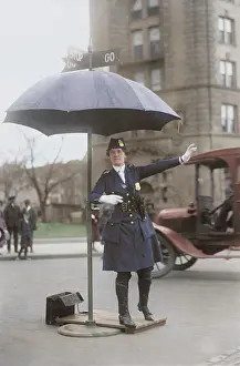 Enforcement: Traffic cop in Washington D.C. circa 1918