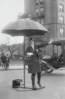 Enforcement: Traffic cop in Washington D.C. circa 1918