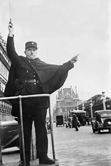 Grille: Traffic policeman in Paris, 1936