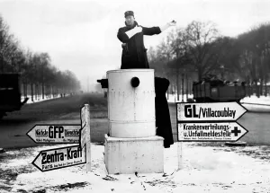 Roundabout: Traffic policeman at a roundabout in Paris, 1942