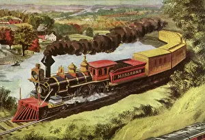 Billowing: A train billowing black smoke passes through the countryside