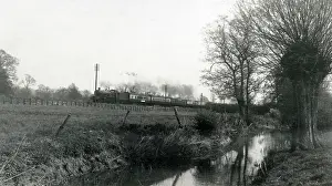 Oddington: Train by the River Evenlode, near Oddington House, Glos