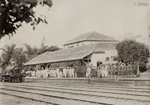 Thatch: Train station with steam engine, India, c.1880s