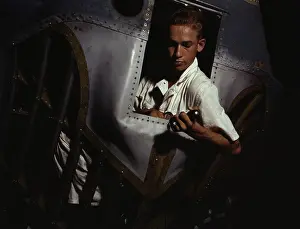 Cone: A trainee working inside the nose cone of