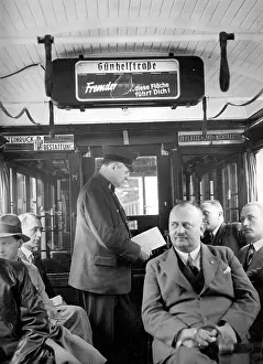 Electrically: Tram conductor in a Berlin tram, 1934