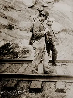 Recession: Two tramps, one with a handkerchief-bound ?