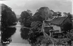 Thatched: Tranquil River Scene with Thatched Cottage