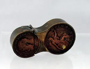 Halfpenny: Trench Art lighter in the shape of the number eight