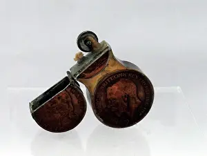 Halfpenny: Trench Art lighter in the shape of the number eight