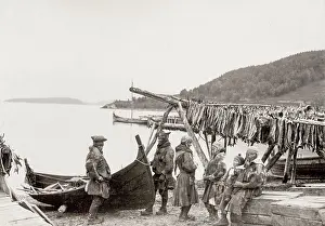 Tromso: Tromso, Norway, fishermen with drying fish