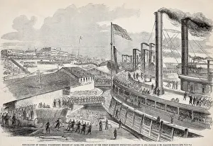 Smokestacks: Several troop transport ships take on equipment