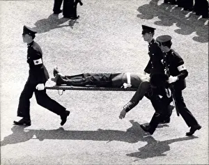 Trooped: Trooping of the Colour, guardsman carried off on stretcher