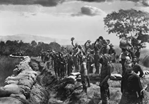 40 50 People: US troops cheering the news of the surrender of