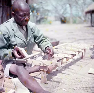 Gourds: Tuning a resonator, Tuning, Hugh Tracey, International