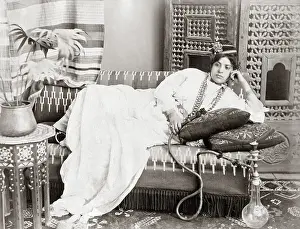 Hookah: Turkish dancer with a hookah, circa 1890