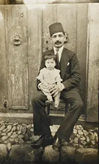 Cobble: Turkish man and his young daughter